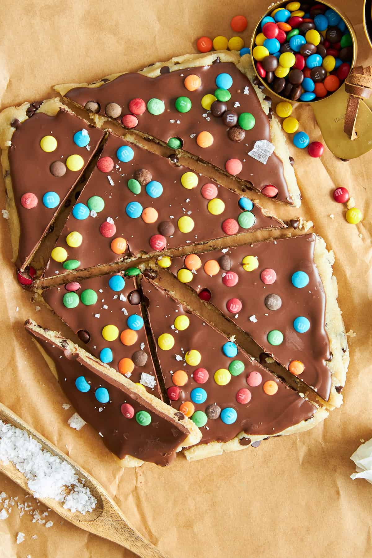 Cookie dough bark cut into large triangles. 