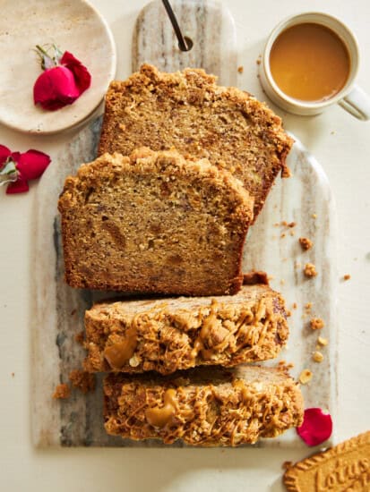 Slices of Biscoff banana bread on a cutting board.