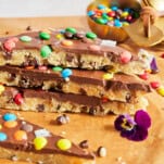 Cookie dough bark pieces stacked on top of each other.