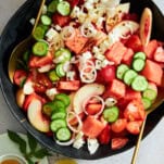 A bowl of watermelon cucumber salad with feta.