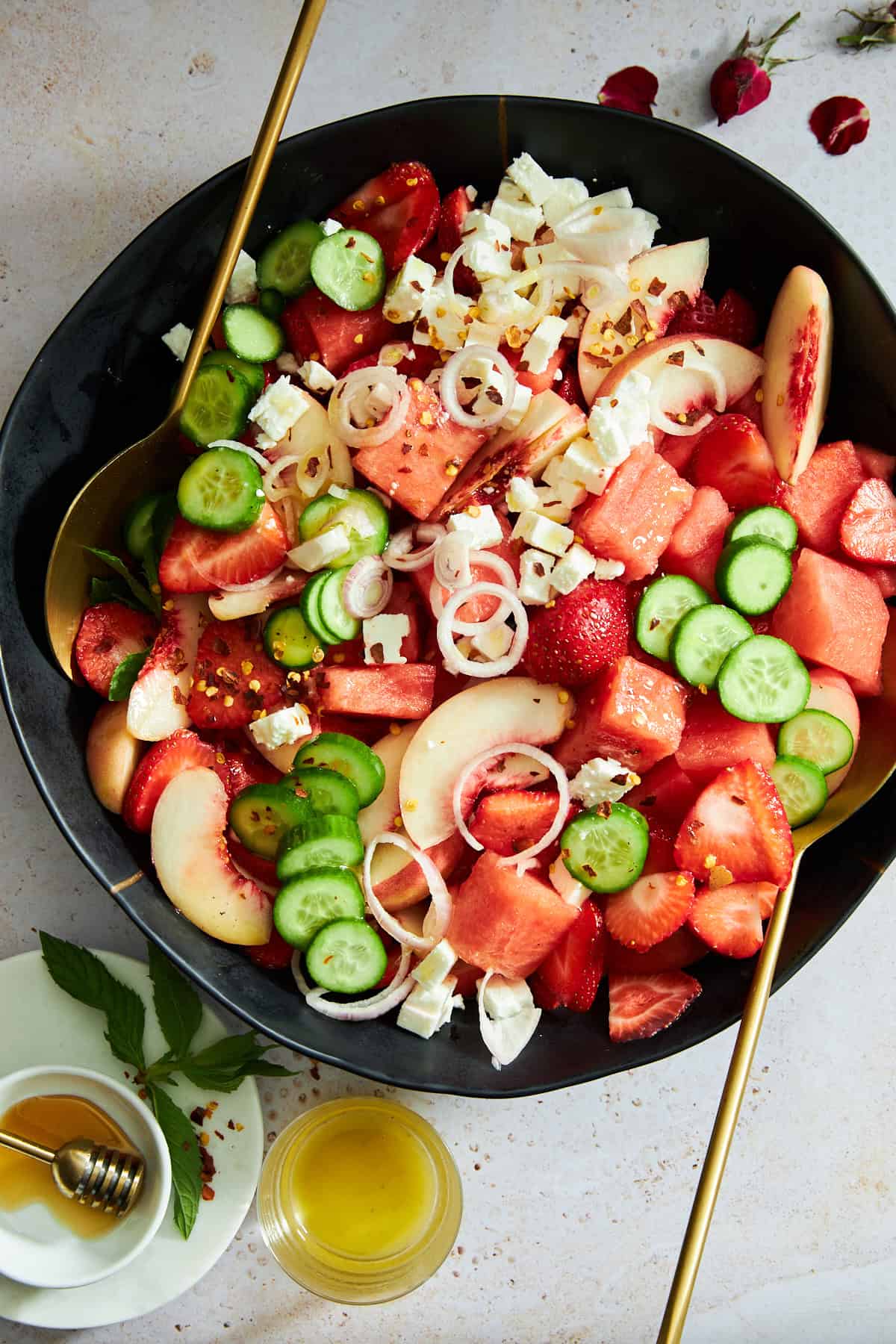 A bowl of watermelon cucumber salad with feta.