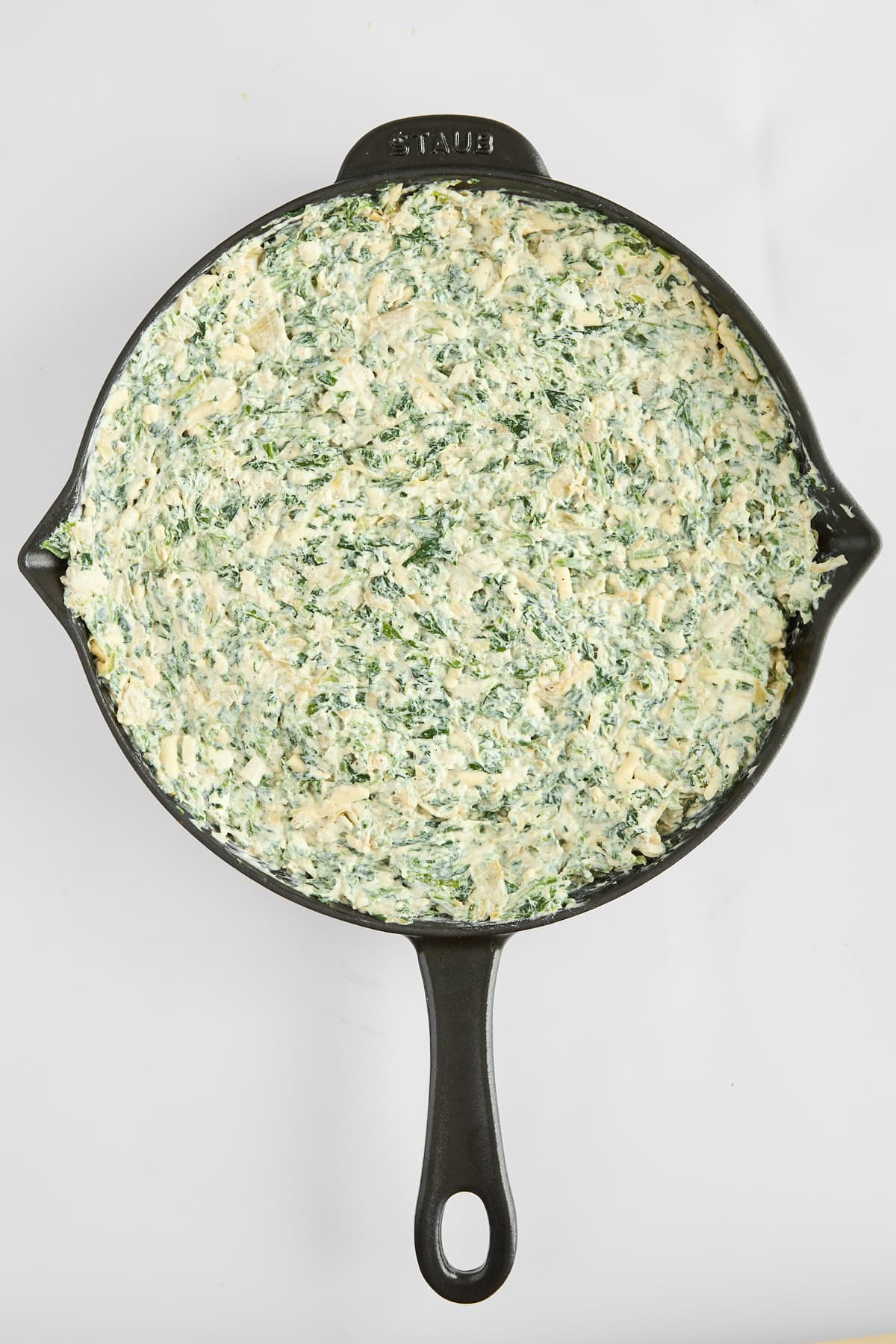 Unbaked chicken spinach and artichoke dip. 