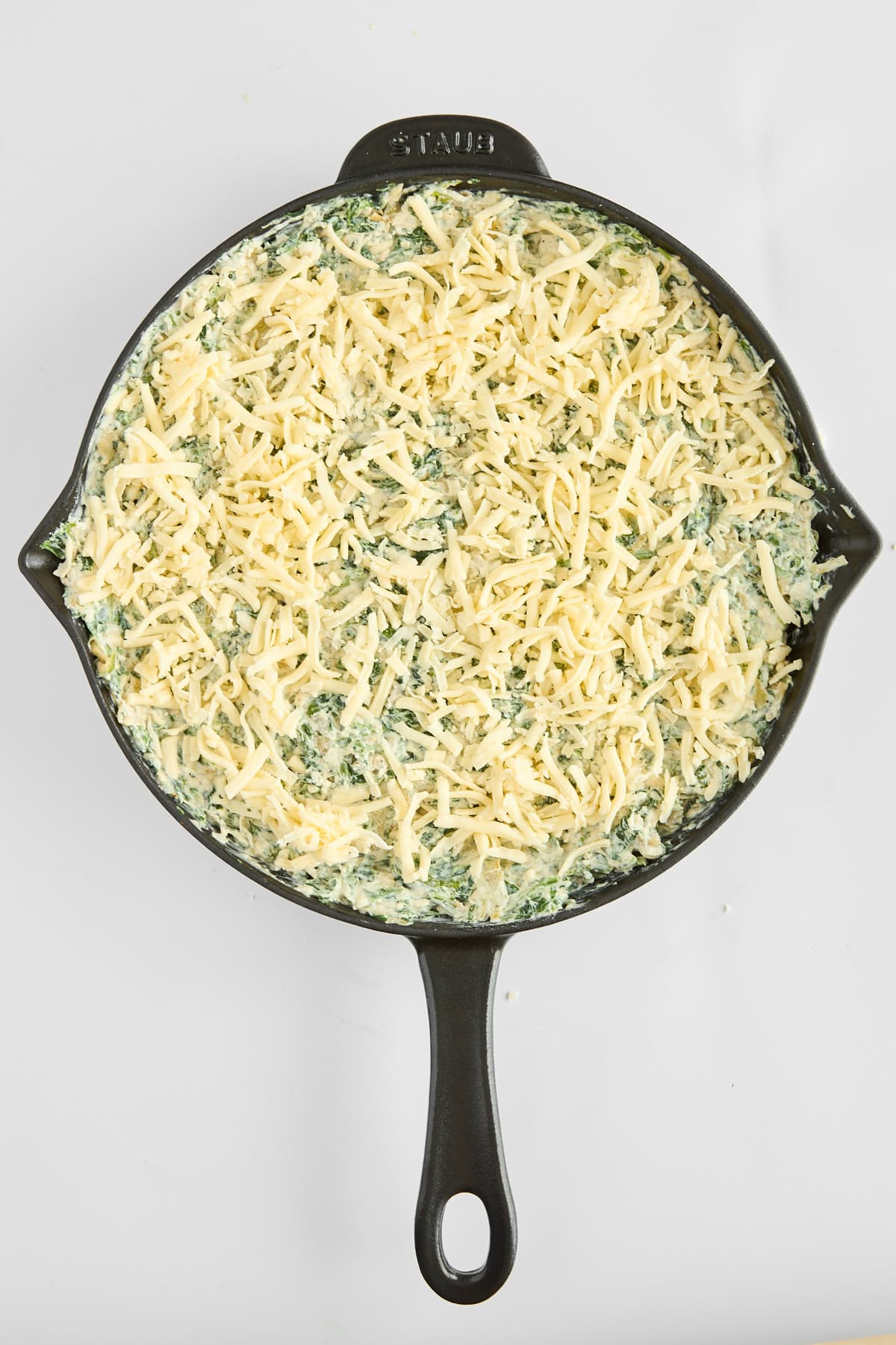 Unbaked chicken spinach and artichoke dip. 