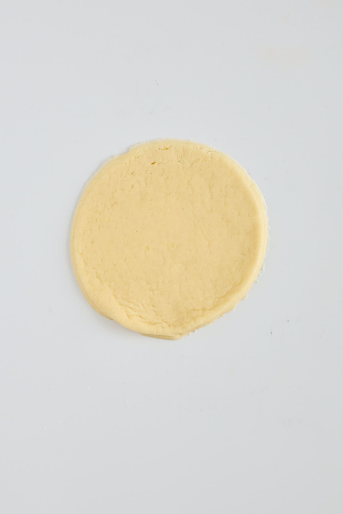 A small circle of pie crust. 