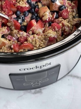 summer berry cobbler in a slow cooker