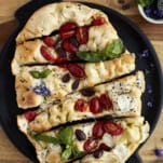 Sliced no knead focaccia bread art on a plate