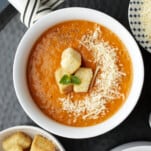 Roasted Tomato Soup with Parmesan Croutons close up.