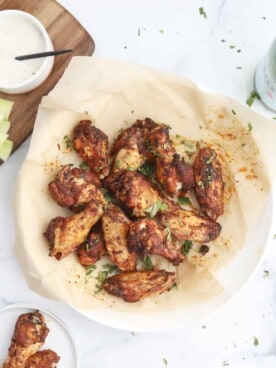 a bowl full of crispy air fryer chicken wings