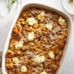 A baking dish of cream cheese French toast casserole.