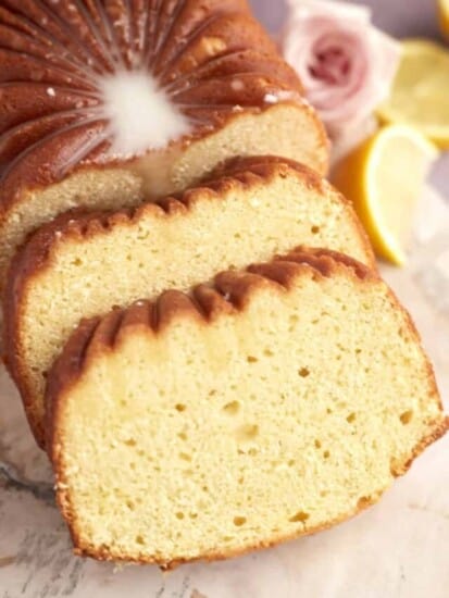 a lemon loaf with two slices cut