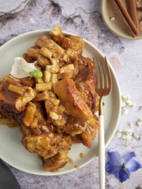 a serving of apple caramel cinnamon rolls on a plate