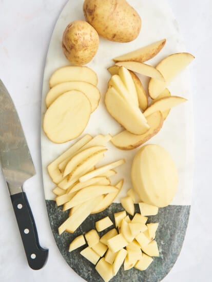 Whole potatoes, peeled potatoes, potato slices, wedges, fries, and cubes.