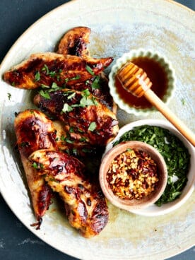 A bowl of honey garlic chicken tenders.