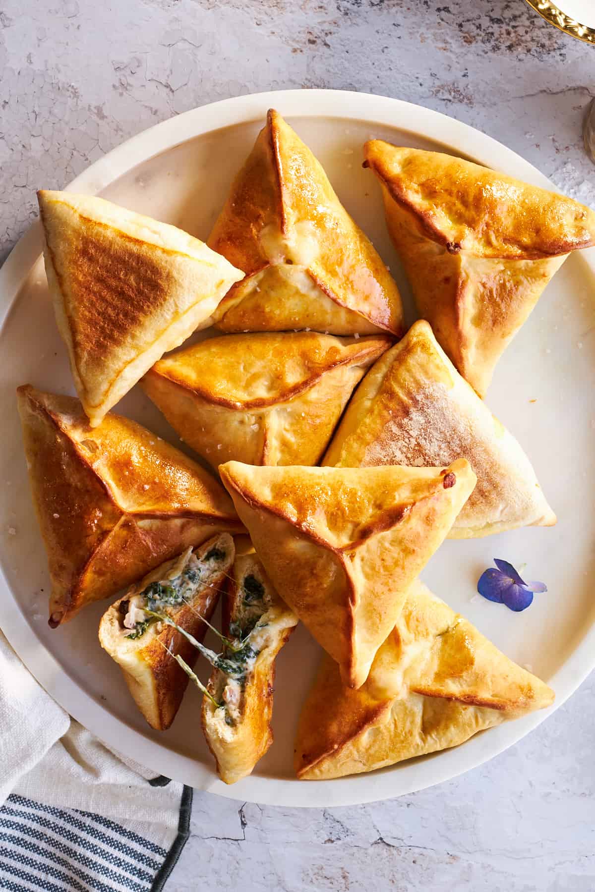 Baked fatayer on a plate.