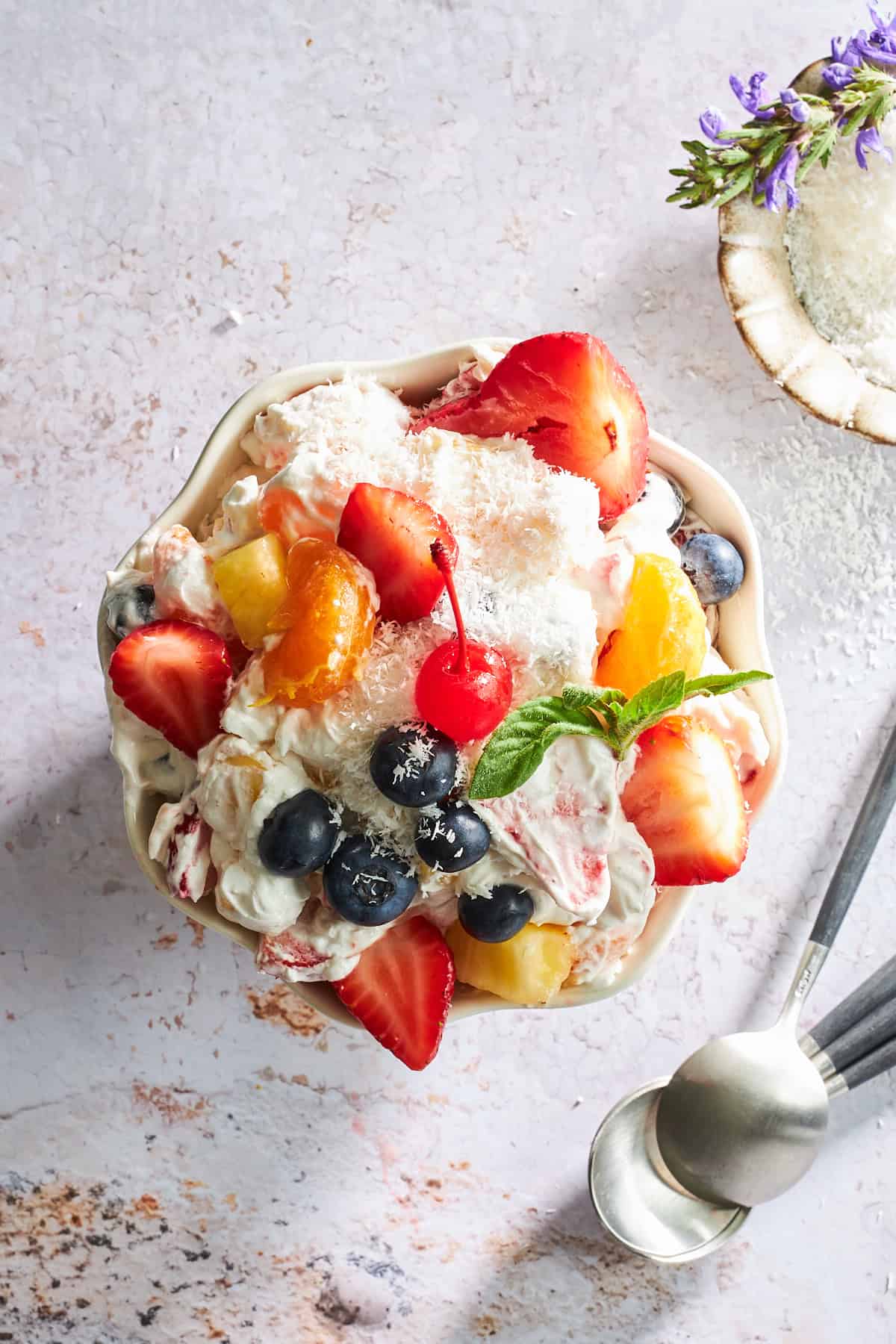 Overhead image of a bowl of ambrosia fruit salad.