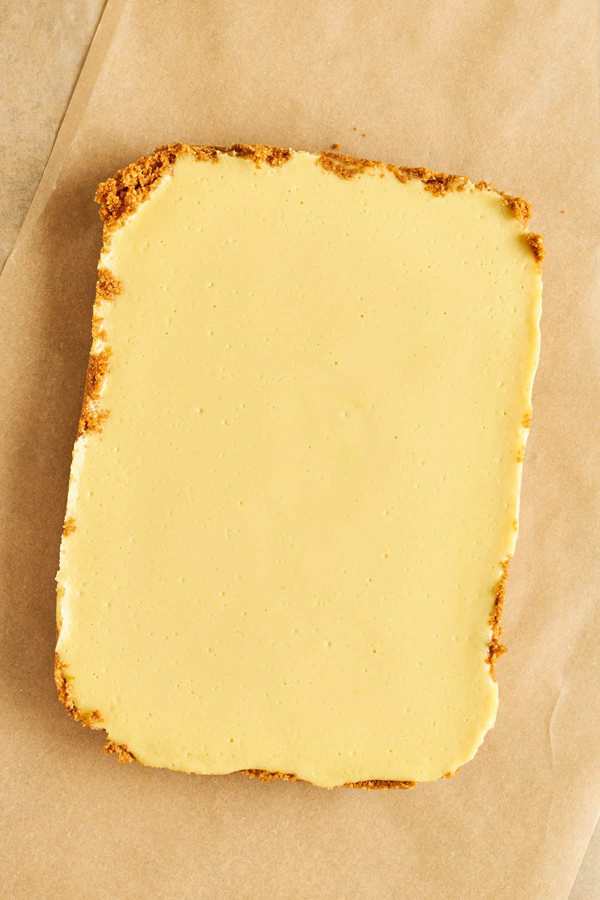 A graham cracker crust topped with a key lime pie filling. 