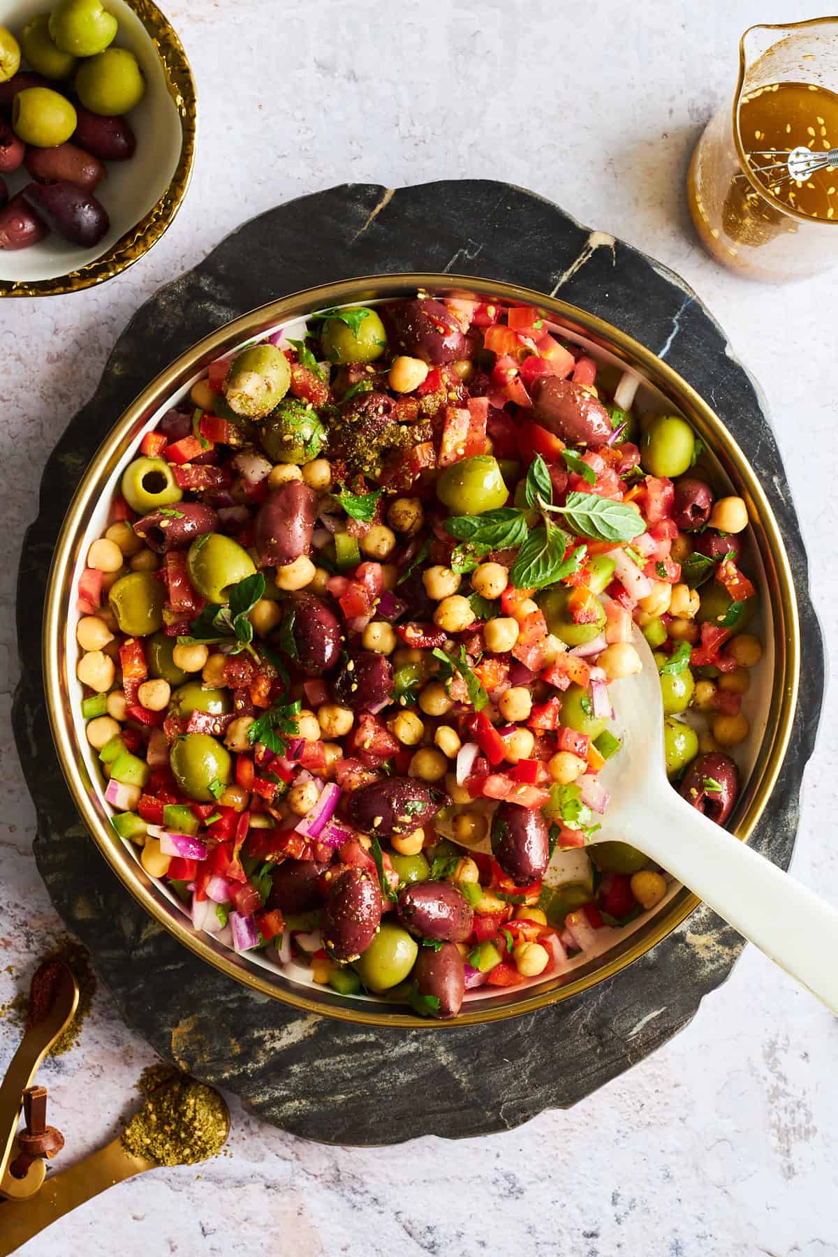 A bowl of olive salad.