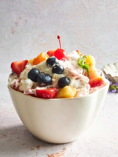 A bowl of ambrosia fruit salad.