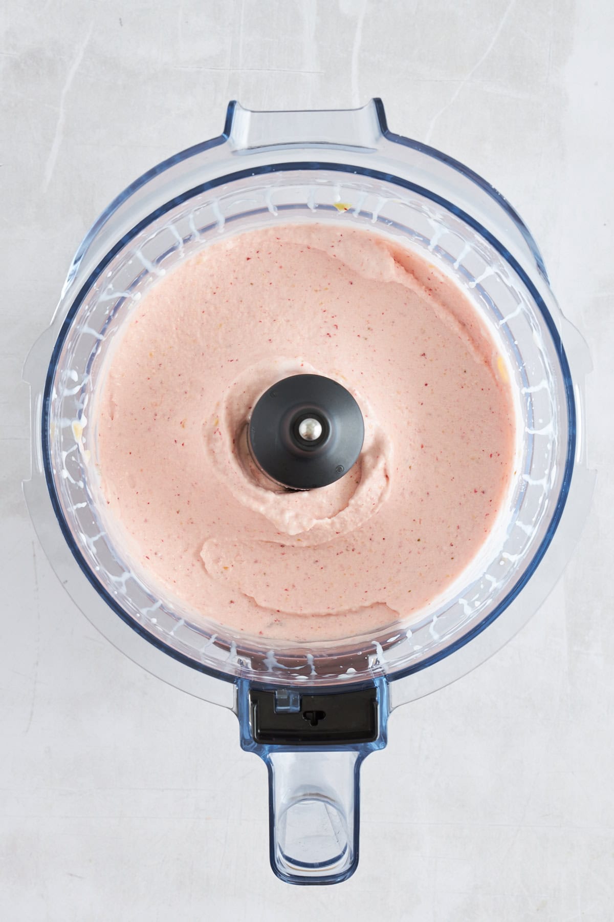 Fruit ice cream in a food processor. 