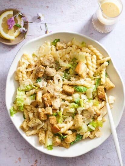 A bowl of Caesar pasta salad.