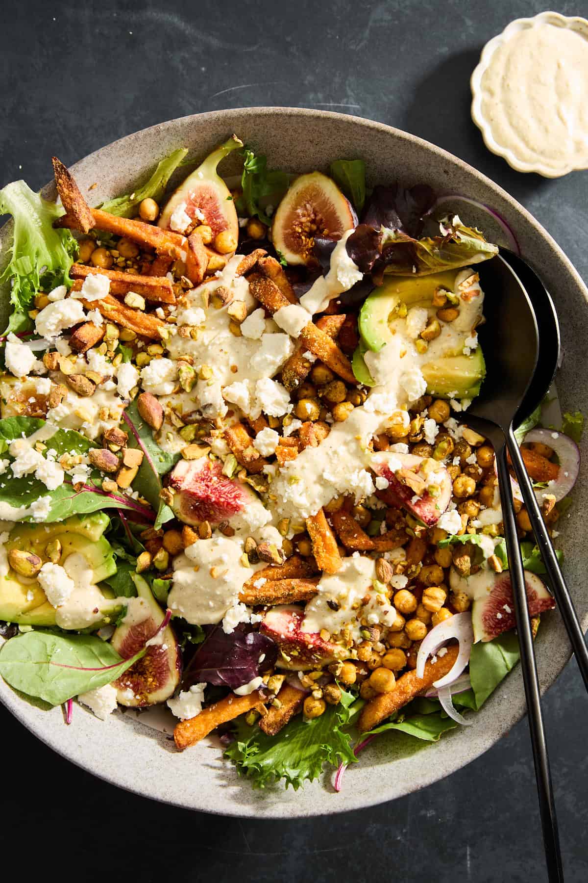 A bowl of Roasted Carrots Chickpea Fig Salad. 