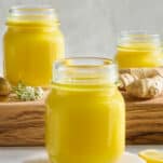 Three jars of ginger turmeric shots.