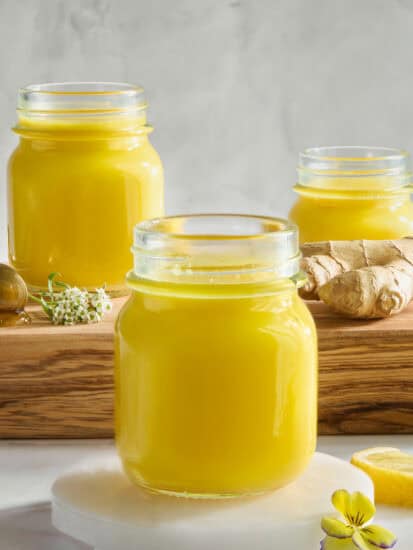 Three jars of ginger turmeric shots.