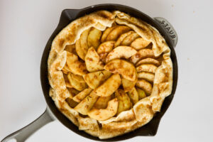 Apple galette in a skillet.