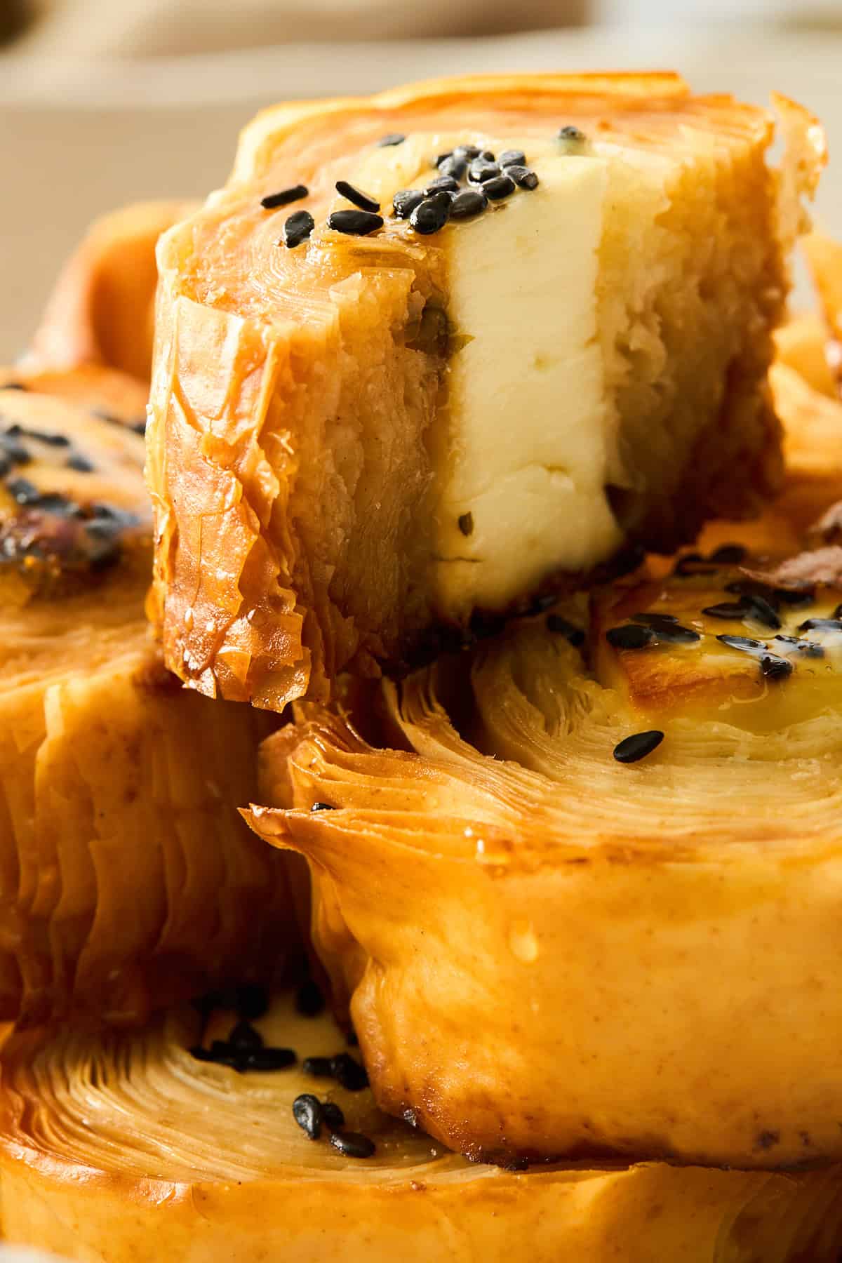 A hot honey feta phyllo roll split in half.