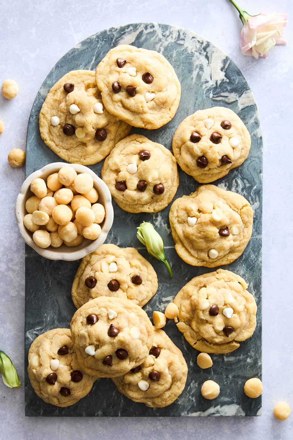 A platter of chocolate chocolate macadamia nut cookies. 