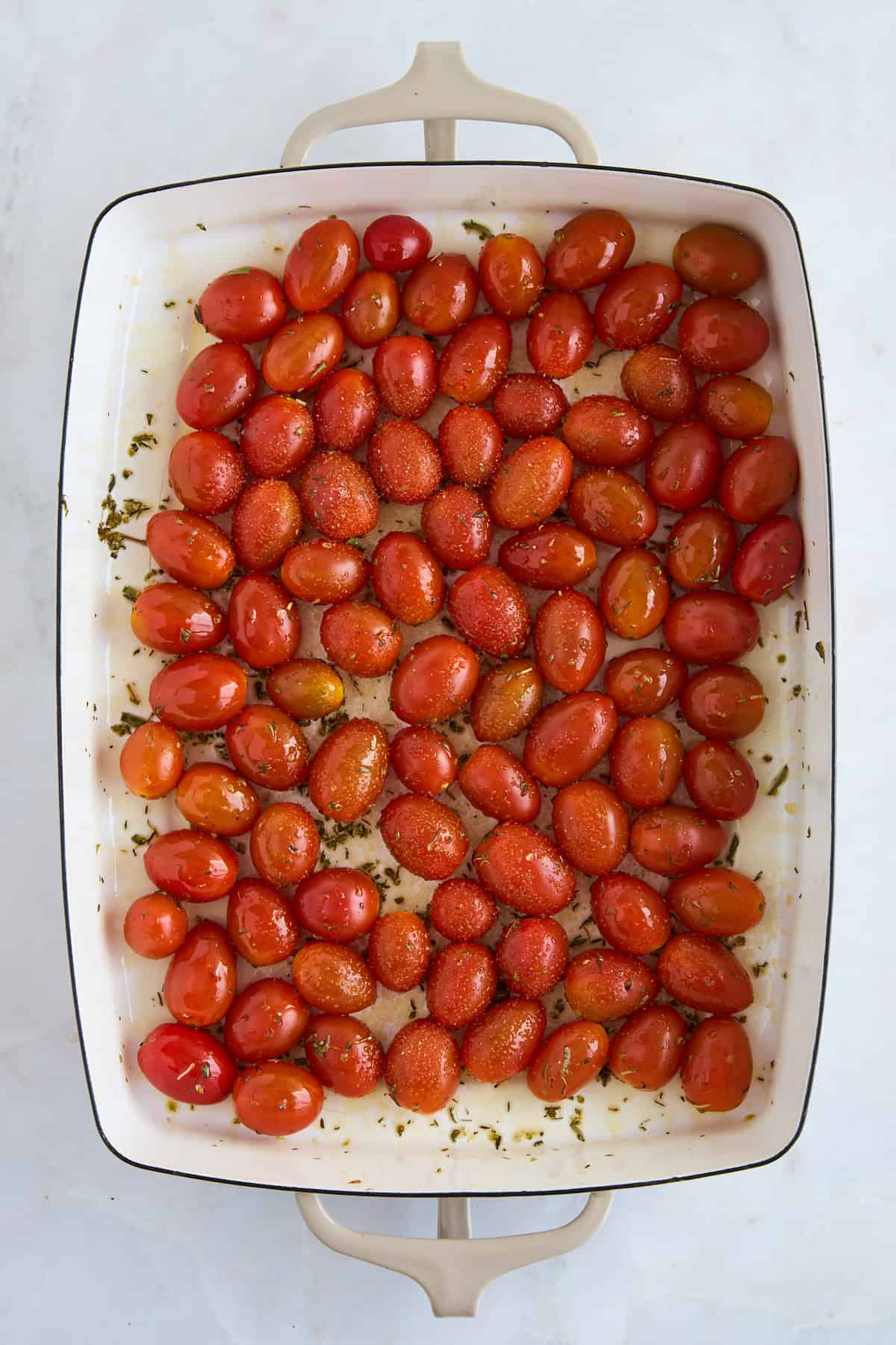 Cherry tomatoes in a baking dish. 