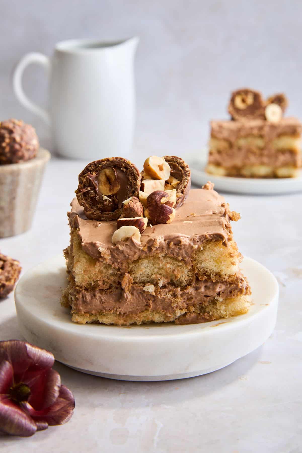 A slice of no-bake Nutella tiramisu on a plate. 