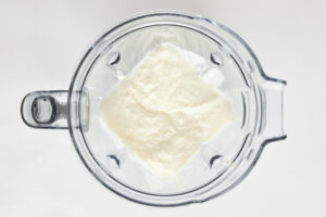 Cottage cheese in a blender.